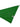 Green fabric with white polka dots on a light gray background